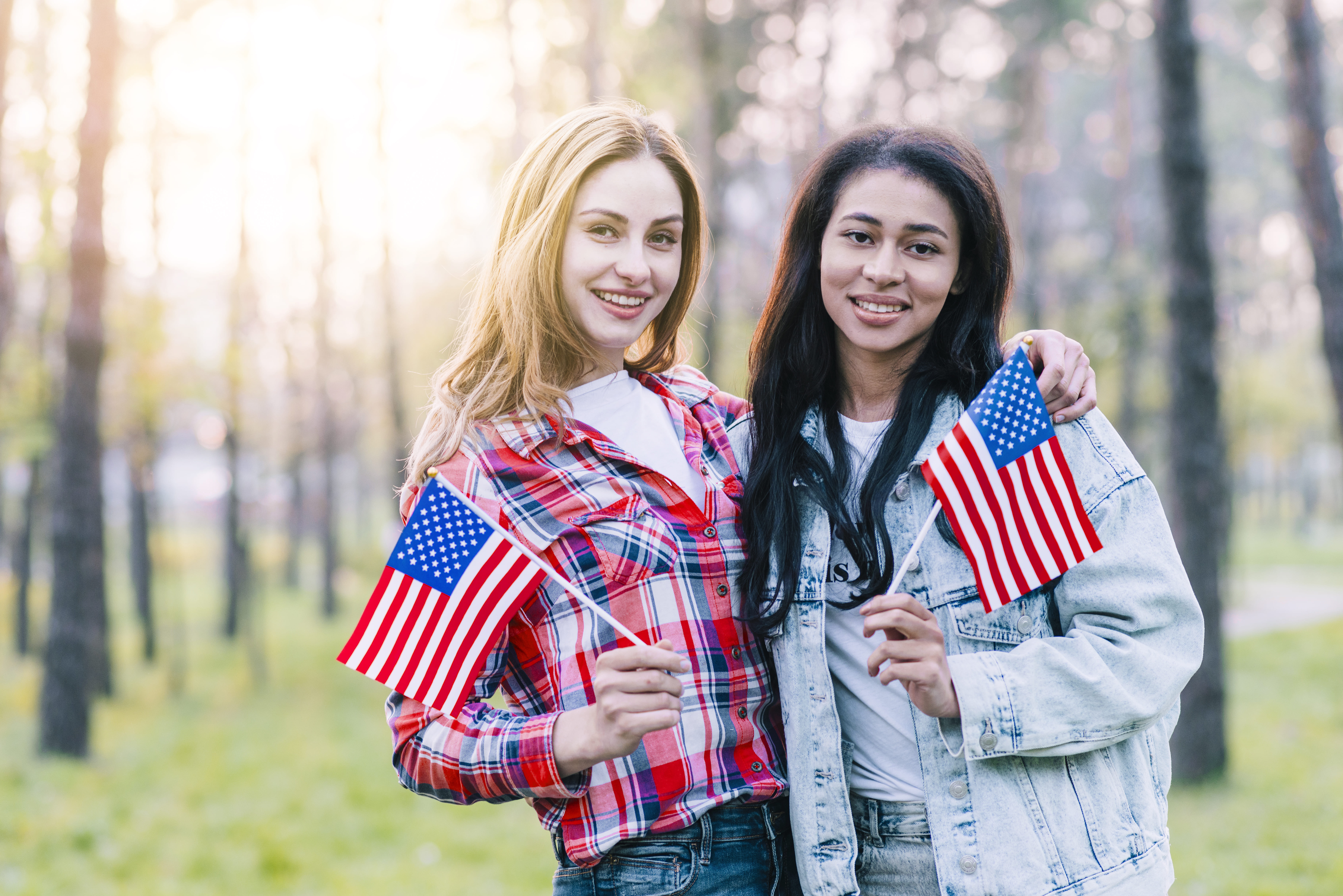 girlfriends-with-small-american-flags-standing-outdoors-(1)